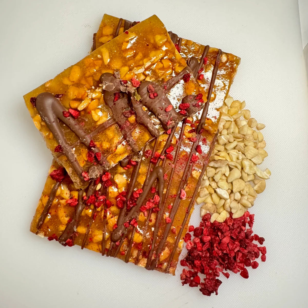 Cashew Brittle with freeze dried raspberries and milk chocolate 200g (Pre order arriving 16/9)
